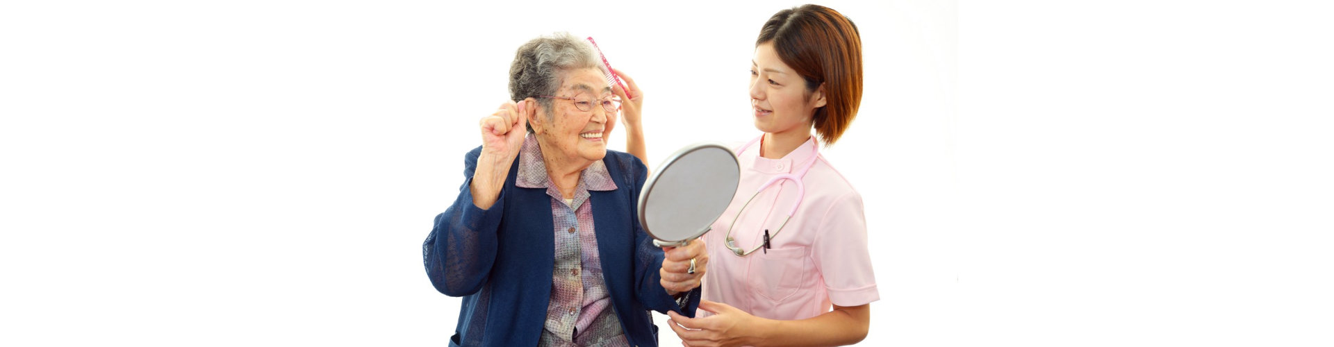 caregiver assisting senior woman