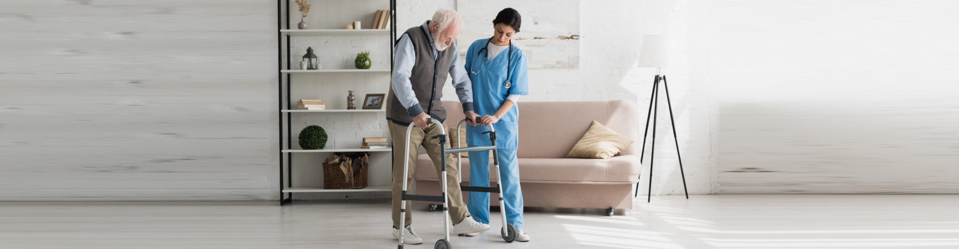nurse assisting senior man